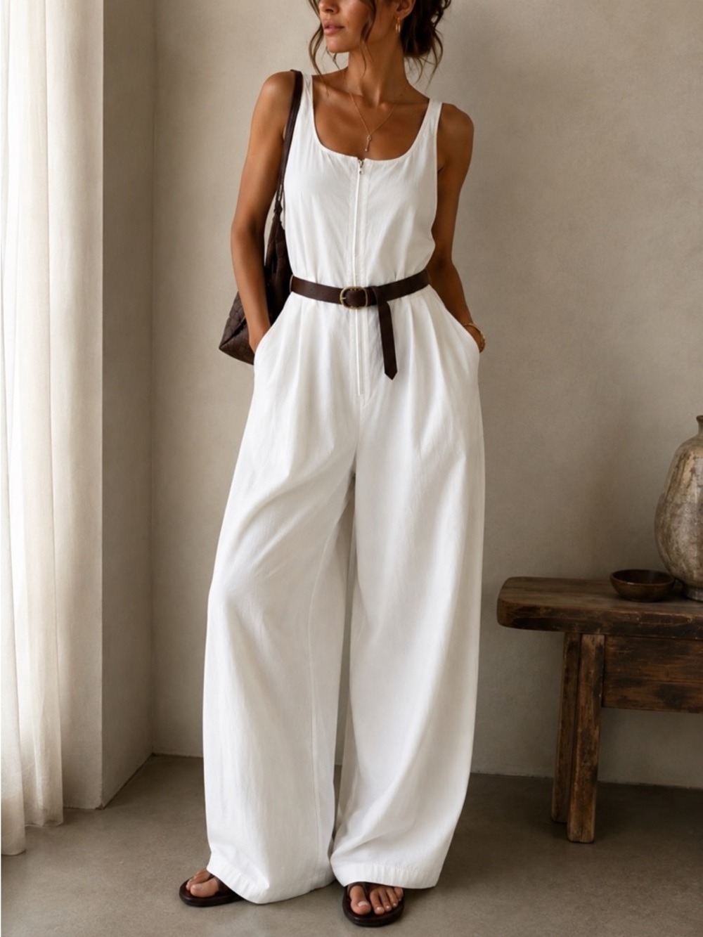 Sleeveless White Wide-Leg Jumpsuit with Front Zip